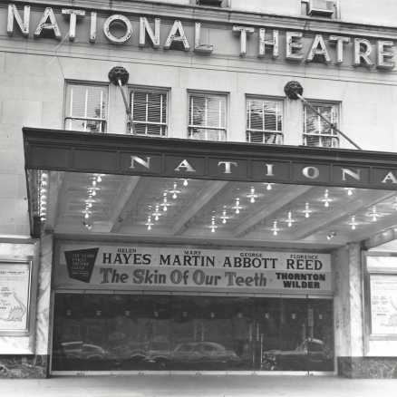 The National Theatre marquee with a banner for the production The Skin of Our Teeth