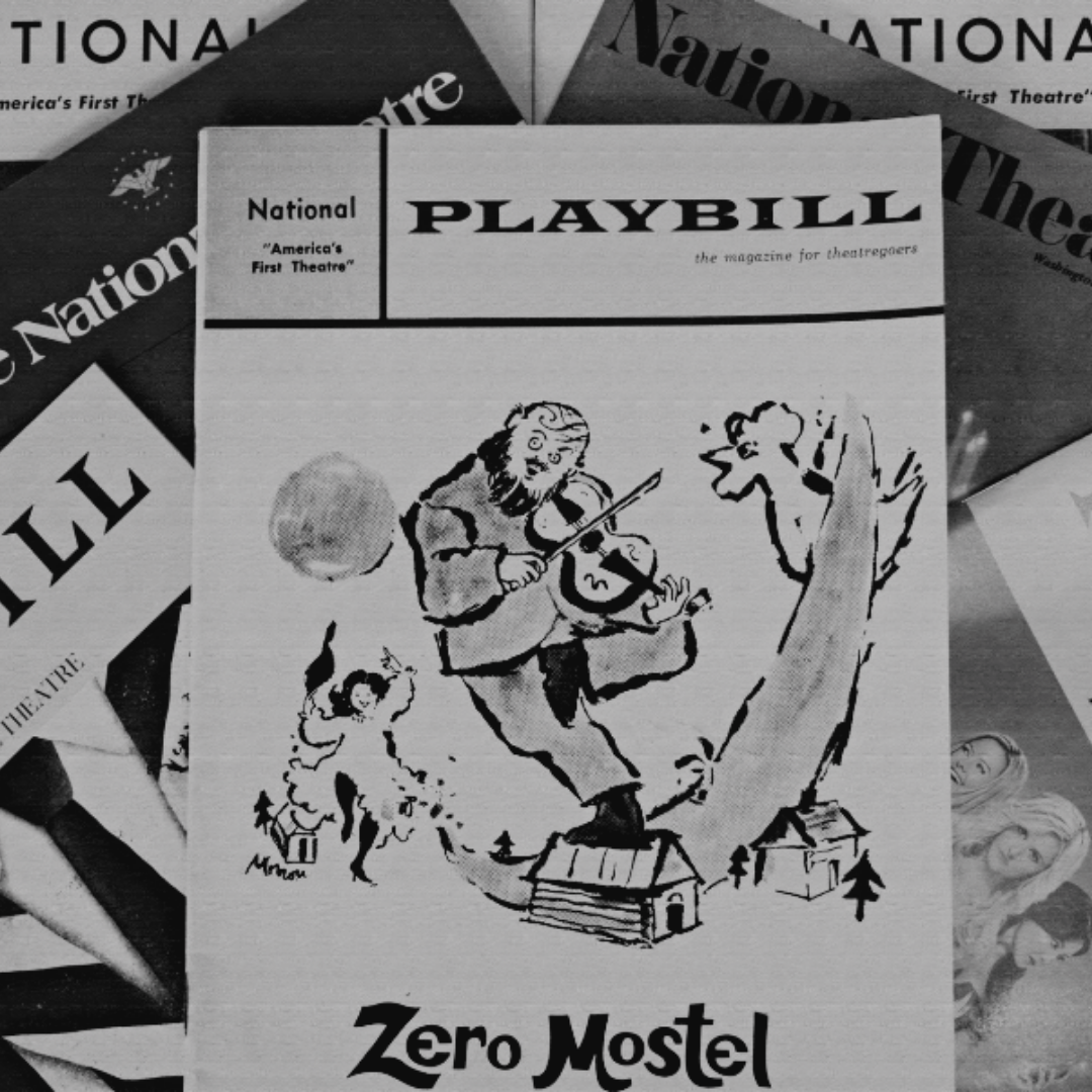 A stack of National Theatre Playbills